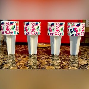 Swig Life s new beach buddies. Brand new !  Set of 4